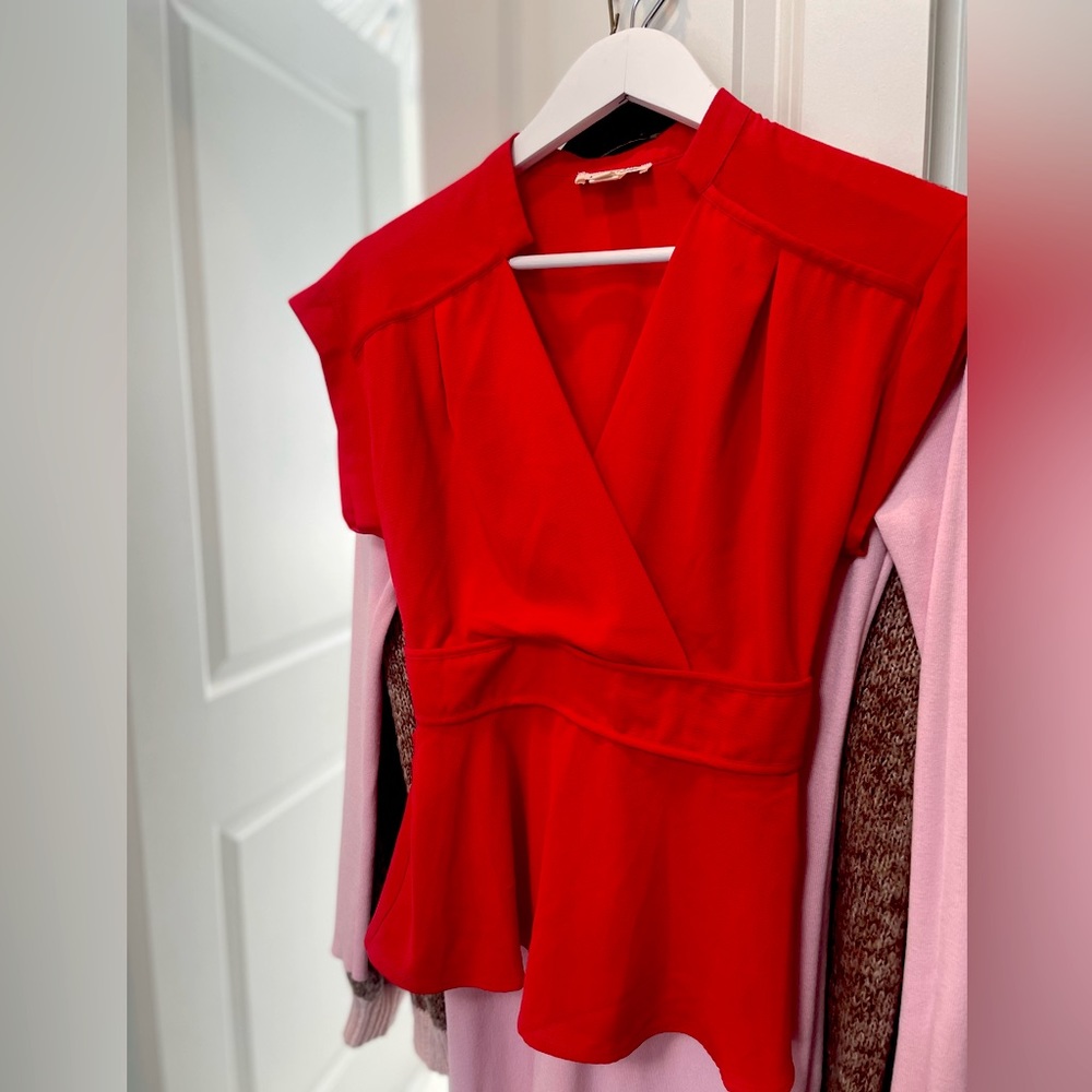 Size small red short sleeve peplum shirt